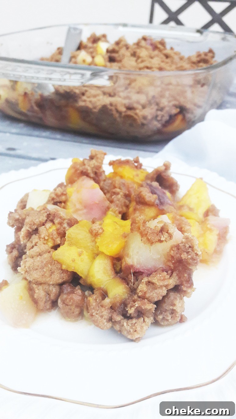 Peach nectarine mango crumble. Easy, healthy, dessert recipe that everyone will love - even kids who don't like fruit!