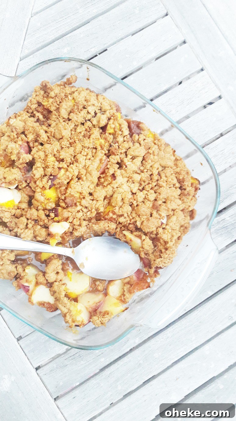 Peach nectarine mango crumble. Easy, healthy, dessert recipe that everyone will love - even kids who don't like fruit!