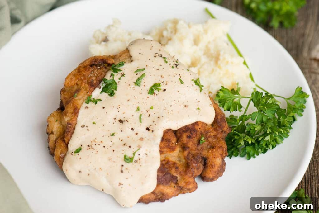 Crispy Country Fried Steak Recipe with Creamy Pepper Gravy 18 Chicken fried steak with mashed potatoes and gravy