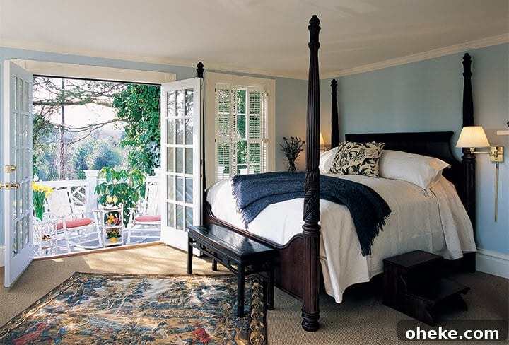 Visit Aiken, SC: Top Things to Do, Where to Stay, and Local Tips 9 A four-poster bed with white coverlet and porch in the Churchill Suite at The Willcox Hotel.