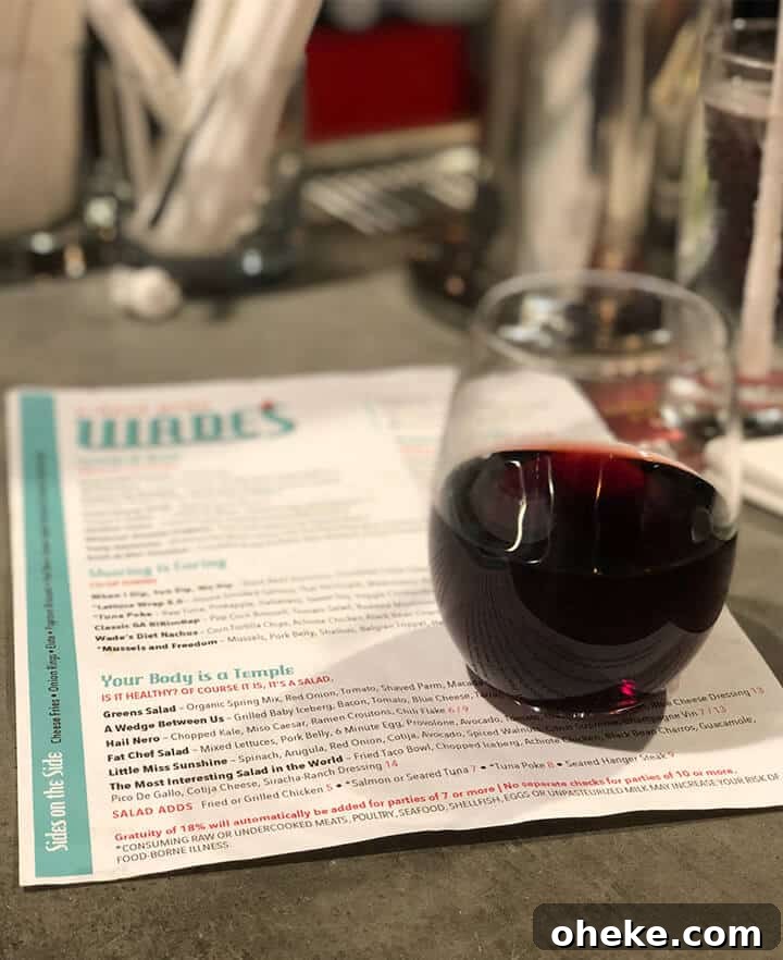 Visit Aiken, SC: Top Things to Do, Where to Stay, and Local Tips 10 A glass of red wine atop the menu on the bar counter at Wade's in Smyrna.