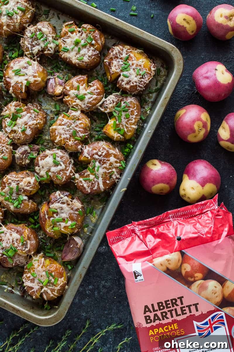 Crispy Herbed Parmesan Smashed Potatoes 4 Herby parmesan smashed potatoes - soft on the inside, crispy on the outside, these are the ultimate side-dish!