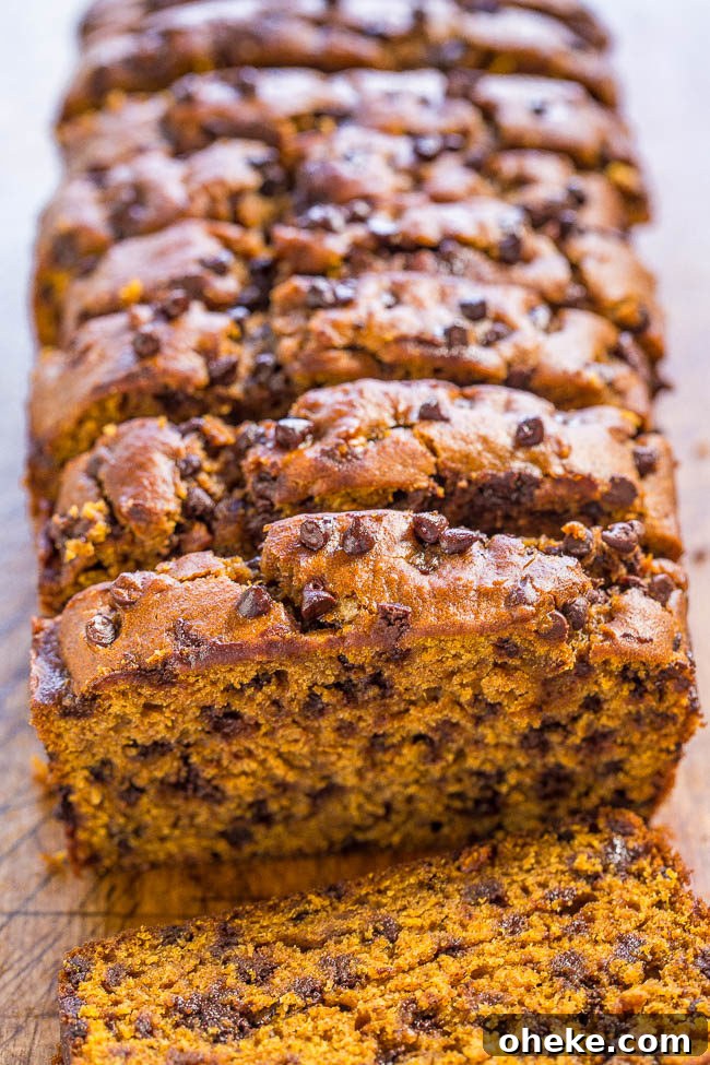 The Best Pumpkin Chocolate Chip Bread sliced into pieces. 