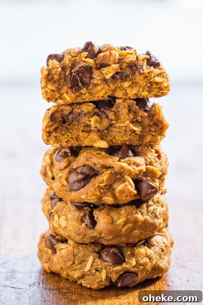 A stack of Soft and Chewy Pumpkin Oatmeal Chocolate Chip Cookies. 