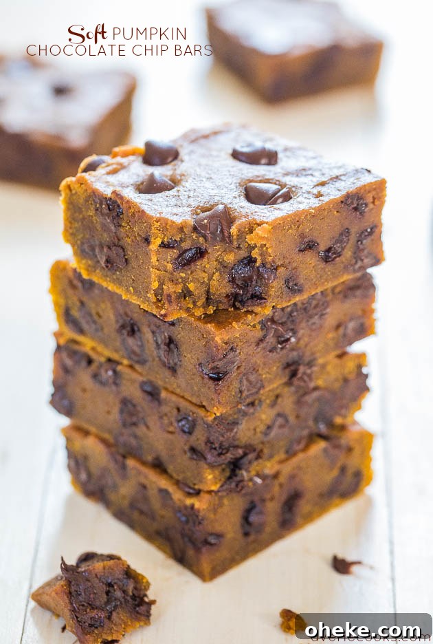 A stack of four Soft Pumpkin Chocolate Chip Bars. 