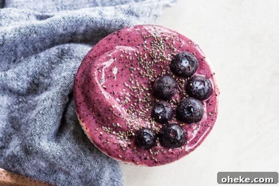 a strawberry blueberry smoothie with peaches and kefir 