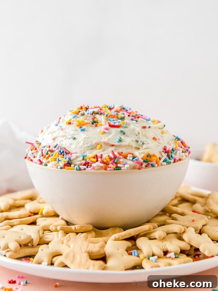 animal crackers in sprinkle covered cake dip