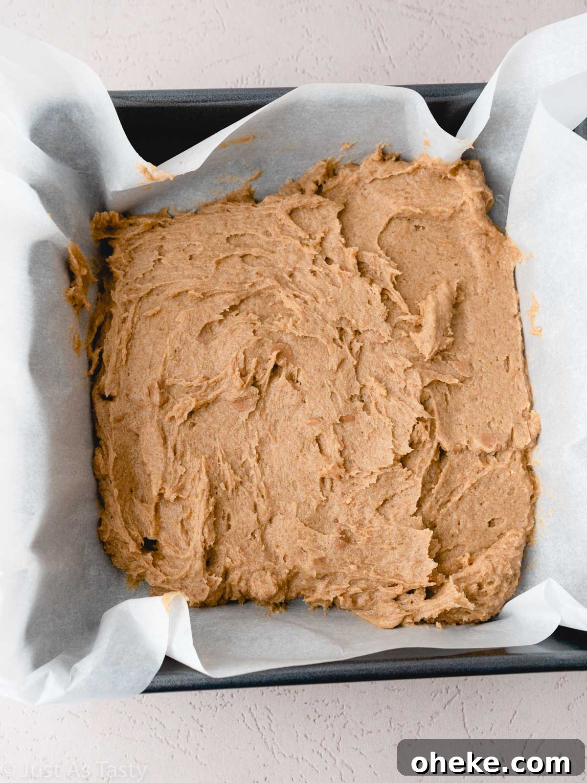 Blondie batter in a square pan.