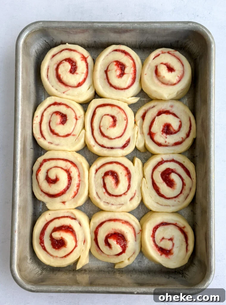 Strawberry Cinnamon Roll Recipe — Soft, Gooey Strawberry Swirls 14 after rising