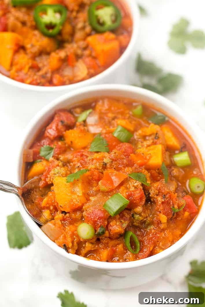 This Paleo sweet potato chili is an easy one-pot dinner recipe with only 8 ingredients! Whole30 approved, can use ground turkey or ground beef. 