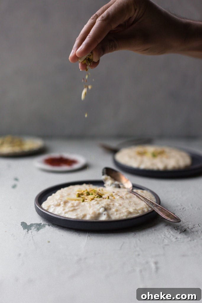 Creamy Instant Pot Kheer Recipe – Quick & Authentic Guide 11 Garnishing Kheer with almonds and pistachios