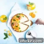 tart with a wedge cut out of the side being removed from the larger tart