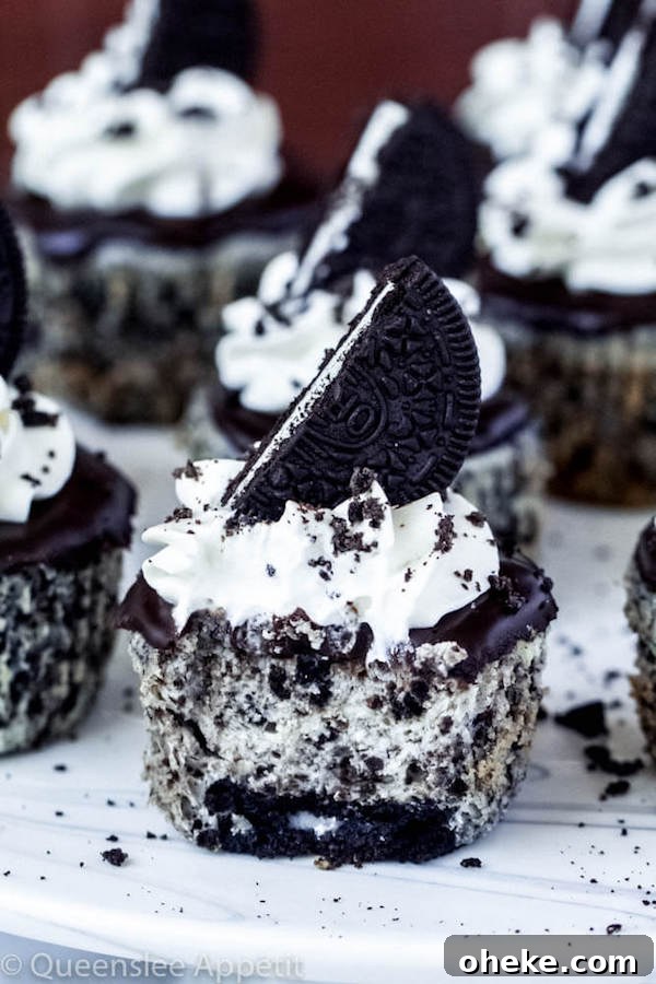 small Oreo cheesecake cupcake cut in half