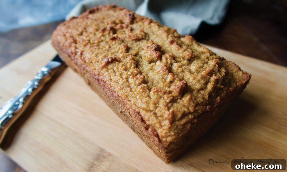 17 Comforting Recipes to Keep You Warm This Season 6 Gingerbread on wooden cutting board with knife.