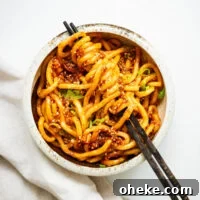 Spicy Gochujang Korean Noodles Recipe 12 A bowl of udon noodles with a spicy gochujang noodle sauce.
