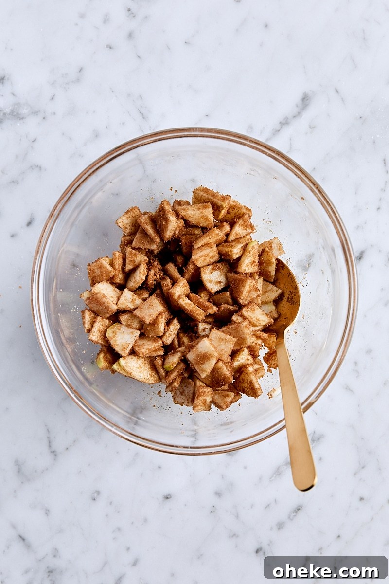 Spiced Apple Fritter Loaf: Cinnamon Apple Bread Recipe 11 Apple-brown sugar mixture in small bowl