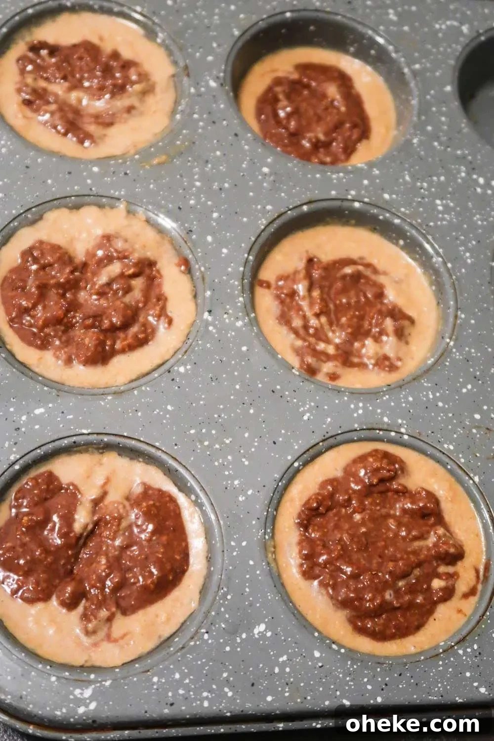 Flourless Marble Oatmeal Muffins with Swirled Chocolate and Vanilla 5 pour mixture