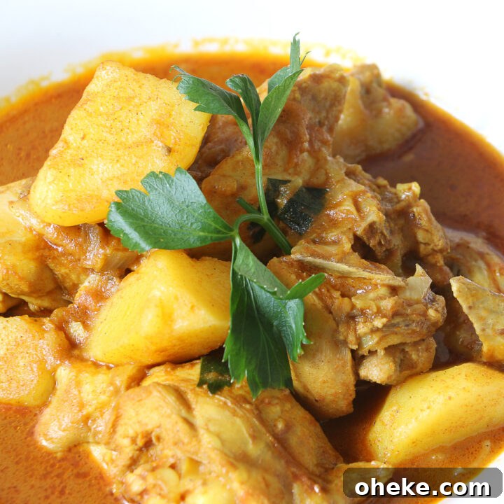Cheats Malaysian Coconut Chicken and Potato Curry, easy no-fuss dinner, quick recipe and delicious with rice or naan bread. Simple ingredients for a tasty chicken dinner.