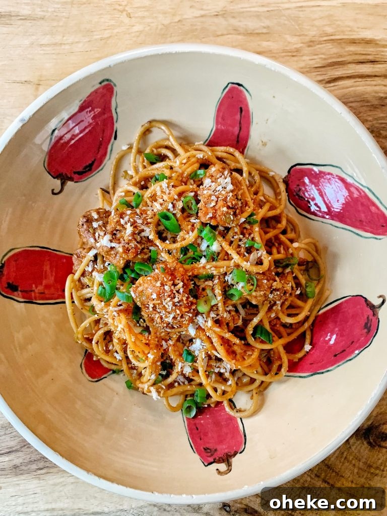 CPK-Style Kung Pao Spaghetti Recipe: How to Recreate the Restaurant Favorite 2 A bowl of Kung Pao spaghetti with crispy chicken and toasted sesame panko.
