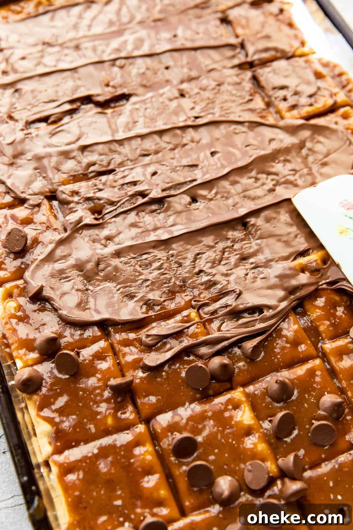 sprinkles and pecans on chocolate layer
