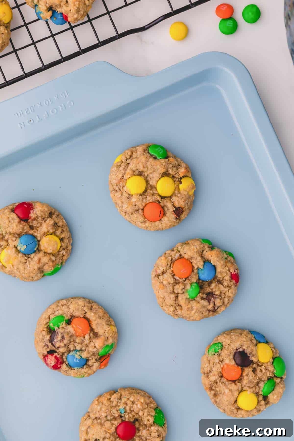 Apple Cinnamon Instant Oatmeal Cookies Recipe — Quick Baked Treat 6 oatmeal cookies on a sheet pan