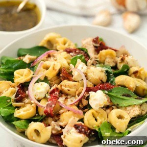 tortellini salad in white bowl