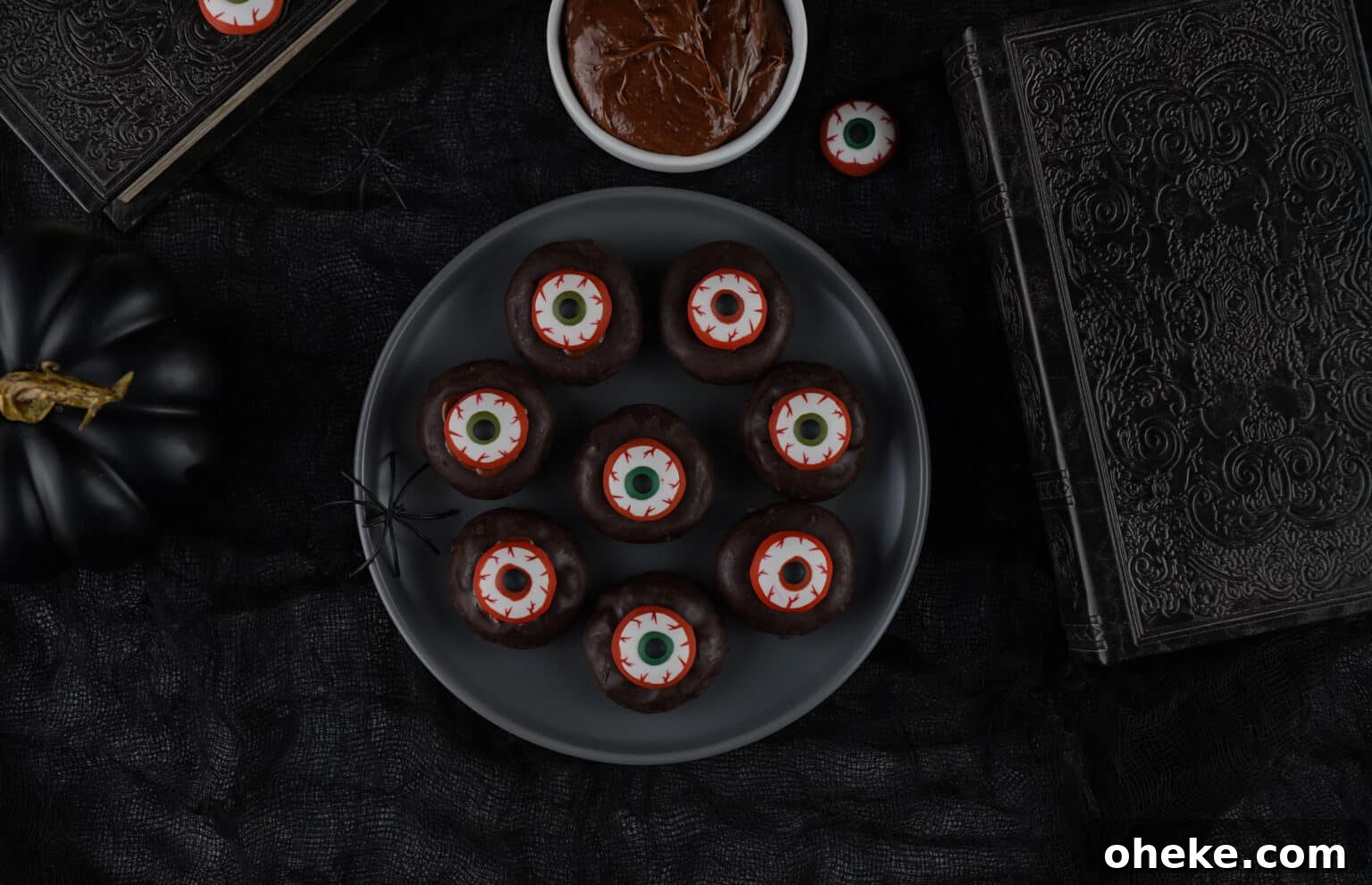 overhead view of plate of mini eyeball donuts