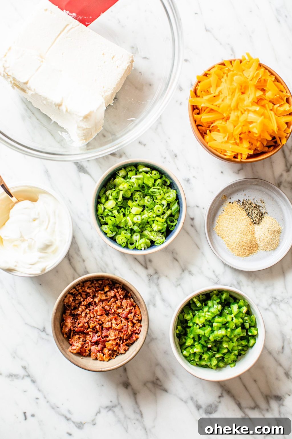 cream cheese, shredded cheddar, sour cream, scallions, seasonings, bacon, jalapenos