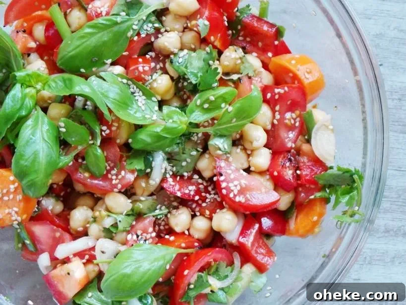 Super fresh and healthy tomato basil and chickpea salad - perfect summer salad to make!