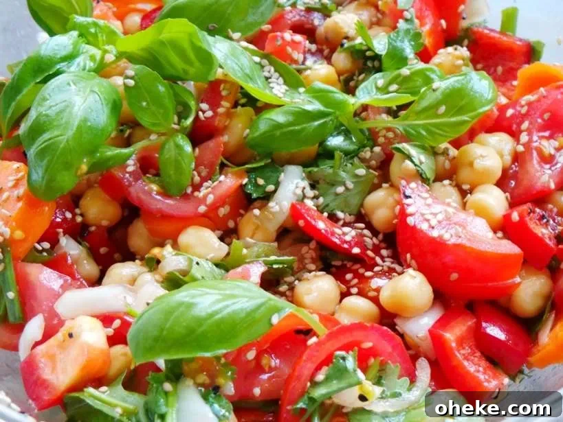 Super fresh and healthy tomato basil and chickpea salad - perfect summer salad to make!