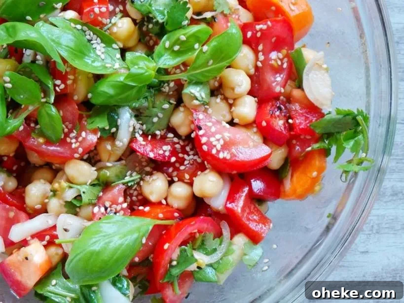 Super fresh and healthy tomato basil and chickpea salad - perfect summer salad to make!