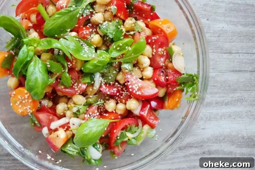 Super fresh and healthy tomato basil and chickpea salad - perfect summer salad to make!