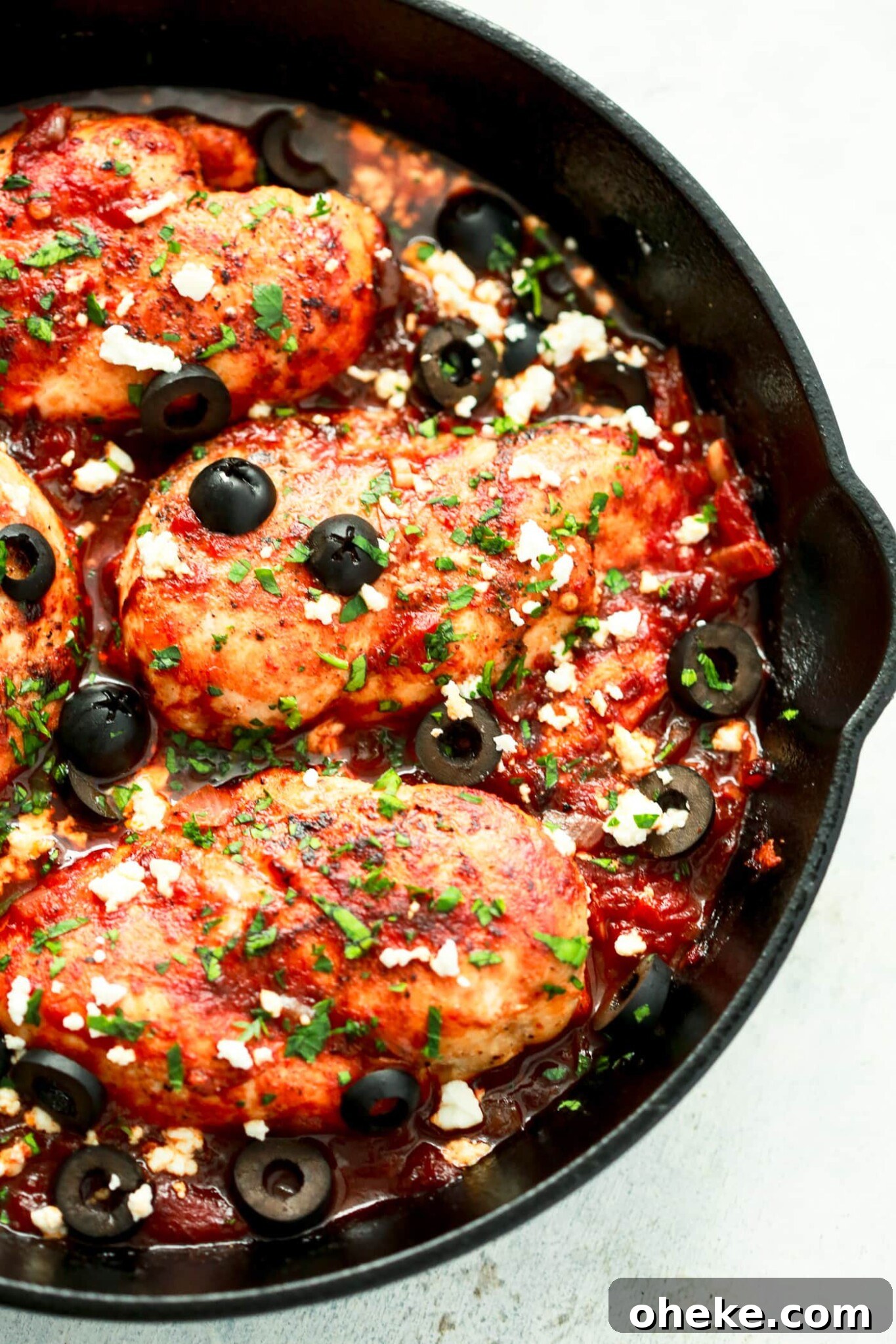 Mediterranean chicken in cast iron skillet. 