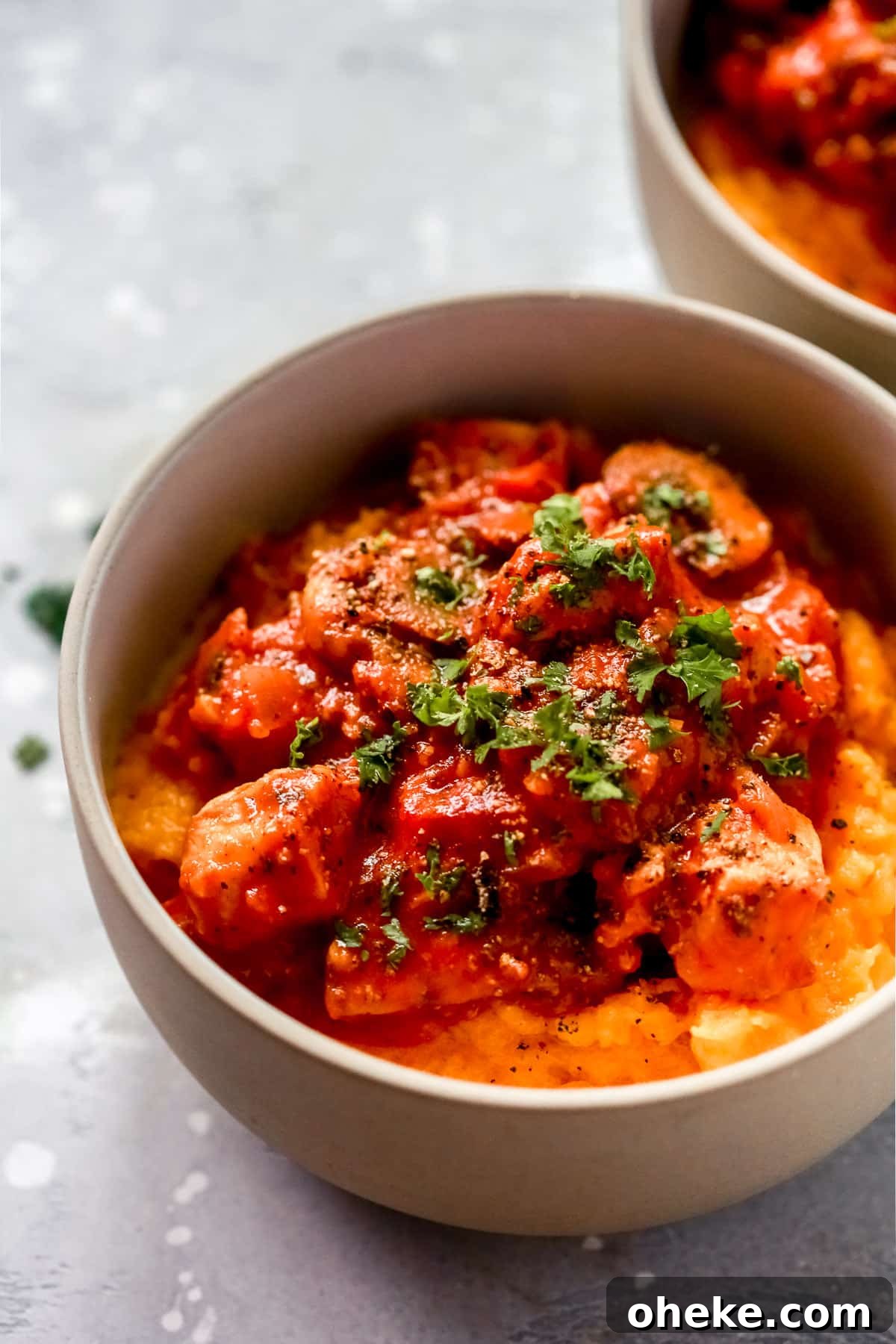 Chicken stroganoff with butternut squash mash in serving bowls. 