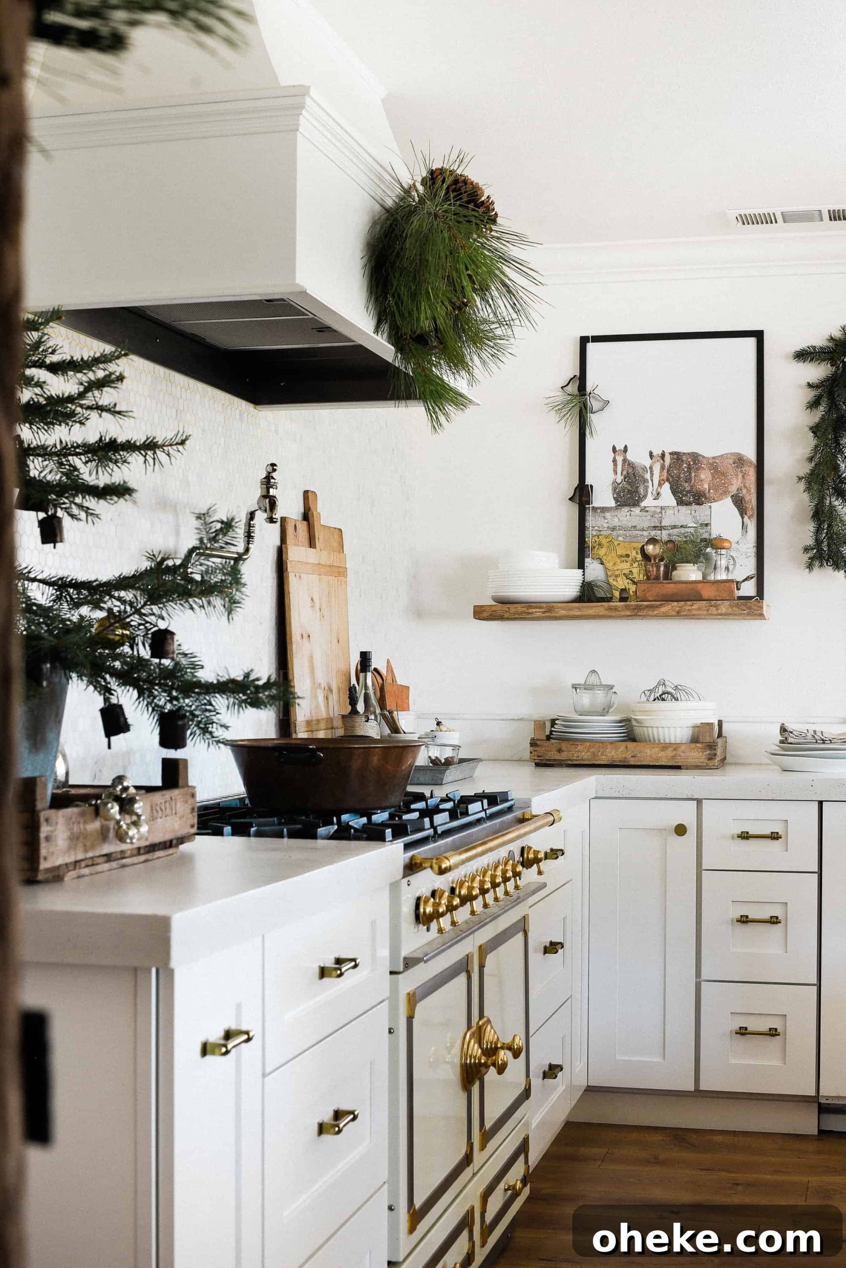 Tour our Christmas kitchen to gather ideas for decorating for the holidays this year! Use greenery and vintage touches to keep things simple and cohesive!