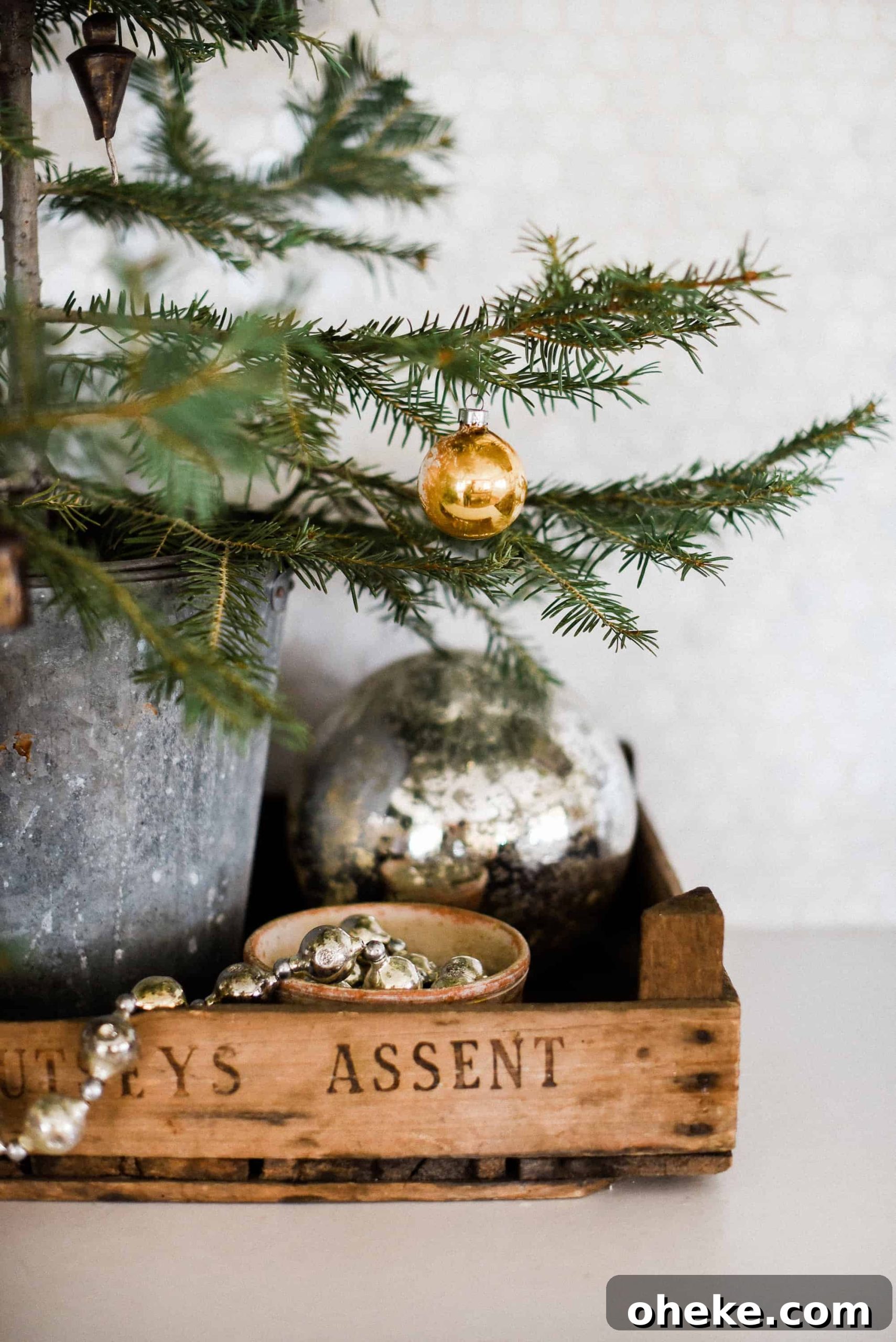 Tour our Christmas kitchen to gather ideas for decorating for the holidays this year! Use greenery and vintage touches to keep things simple and cohesive!