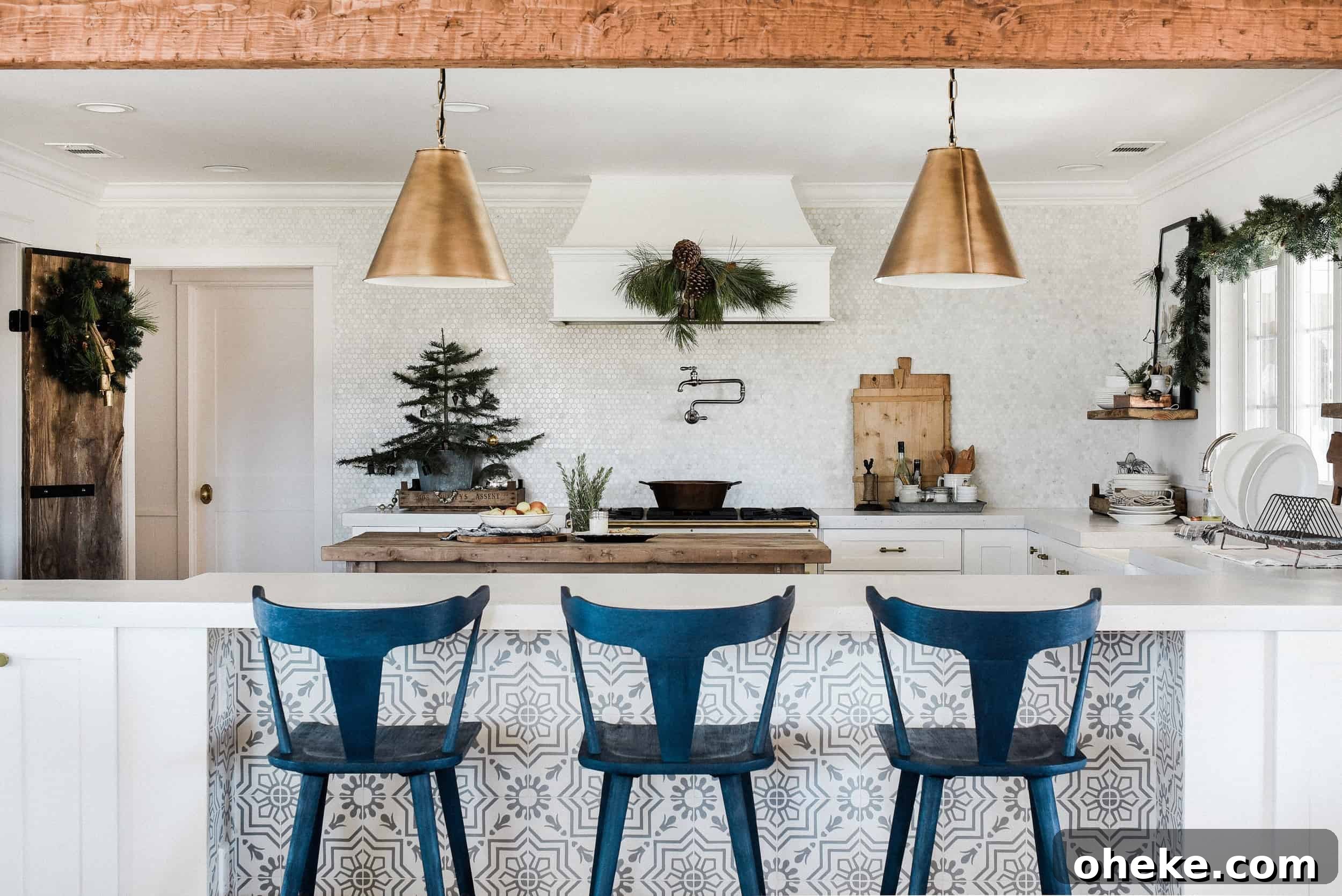 Tour our Christmas kitchen to gather ideas for decorating for the holidays this year! Use greenery and vintage touches to keep things simple and cohesive!