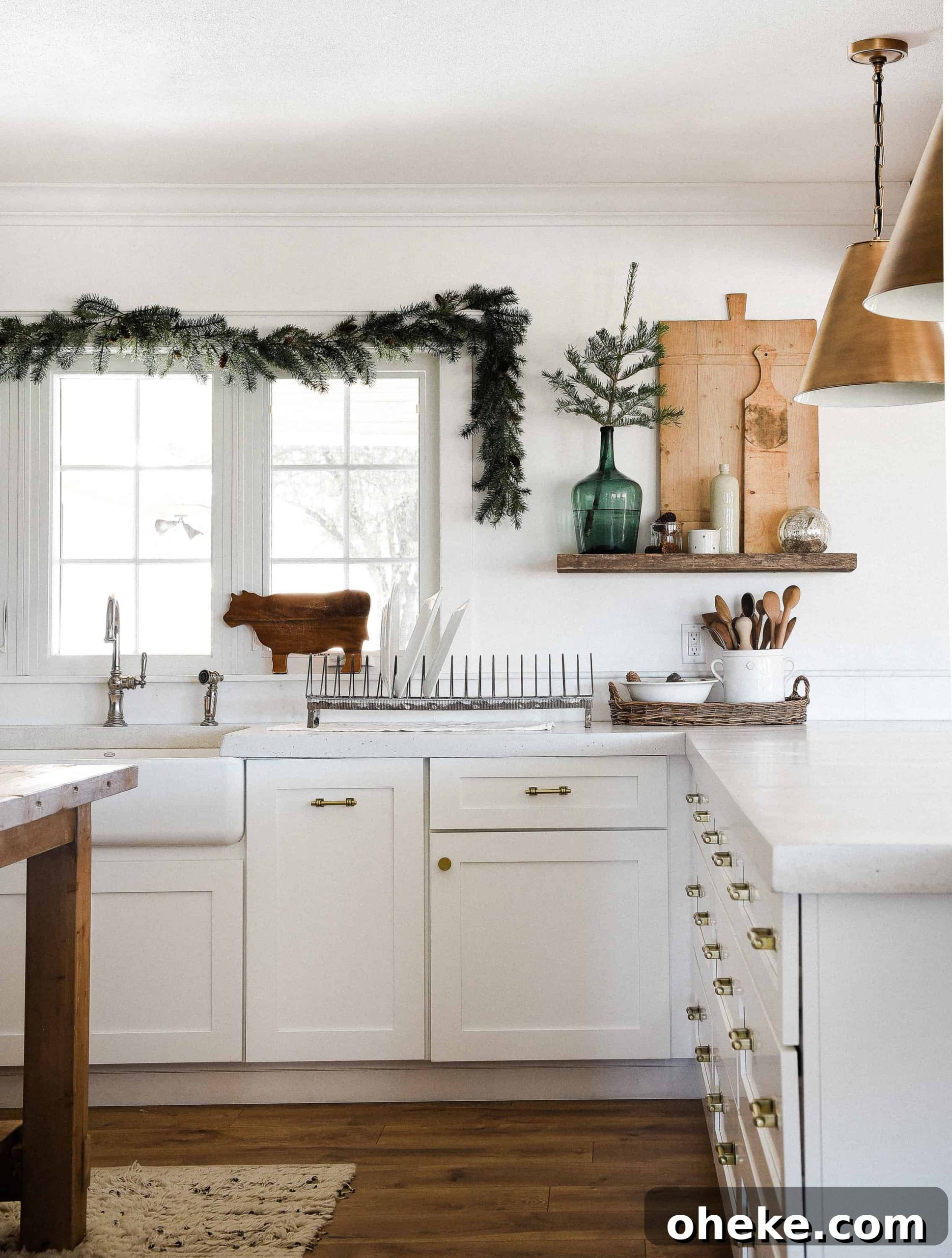 Tour our Christmas kitchen to gather ideas for decorating for the holidays this year! Use greenery and vintage touches to keep things simple and cohesive!