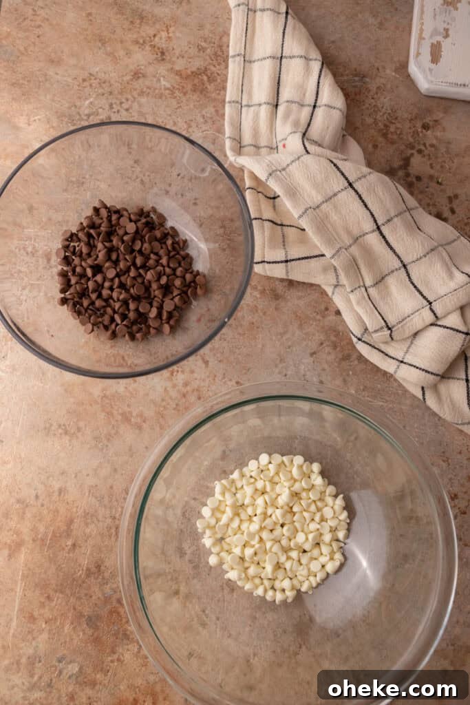 milk chocolate and white chocolate chips in separate bowls